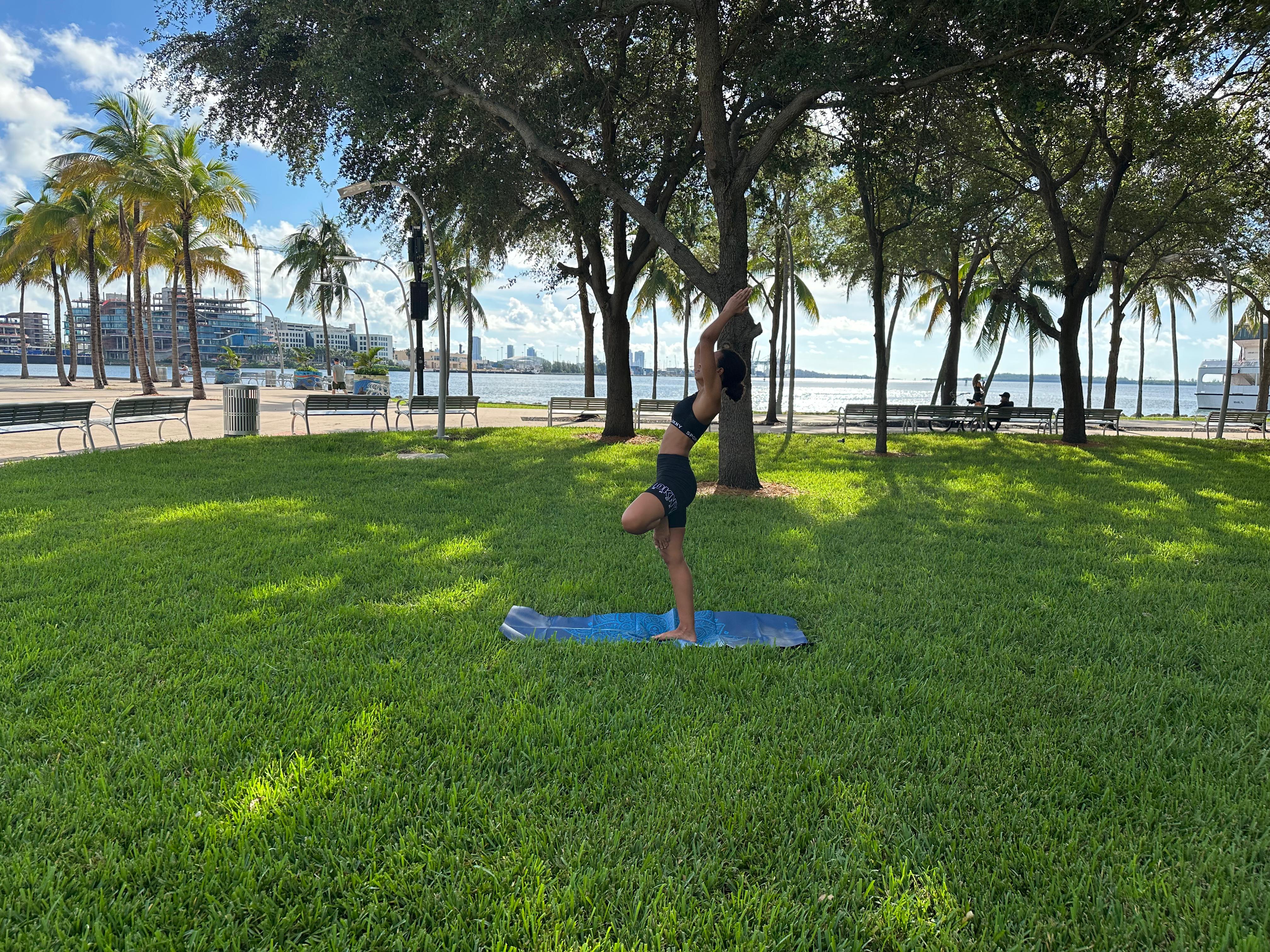 Tree pose waterfront