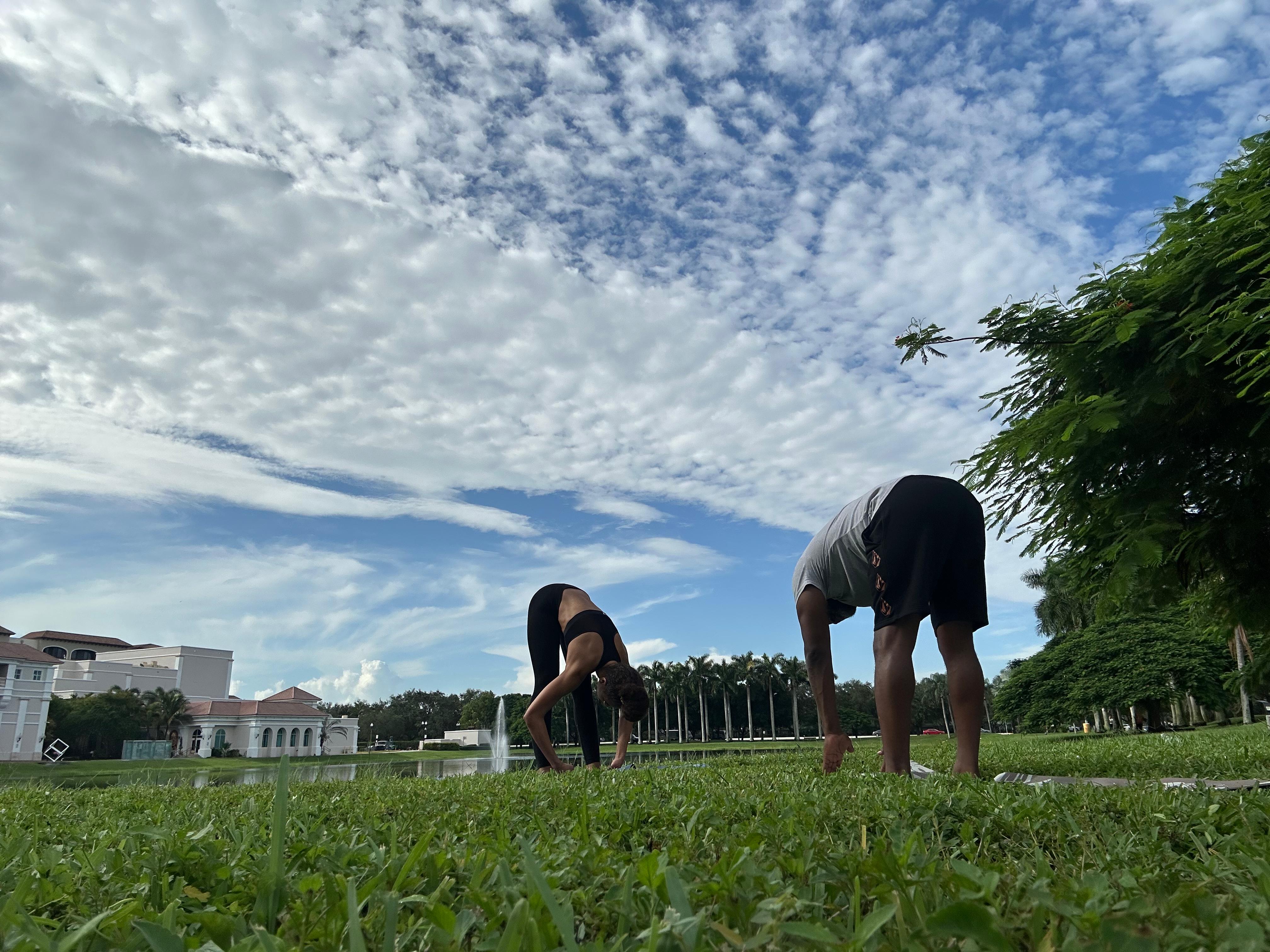 Partner yoga outdoors