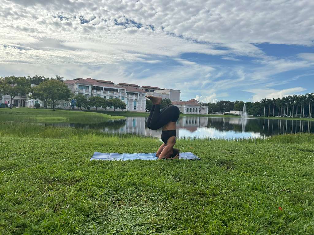 Headstand by the lake