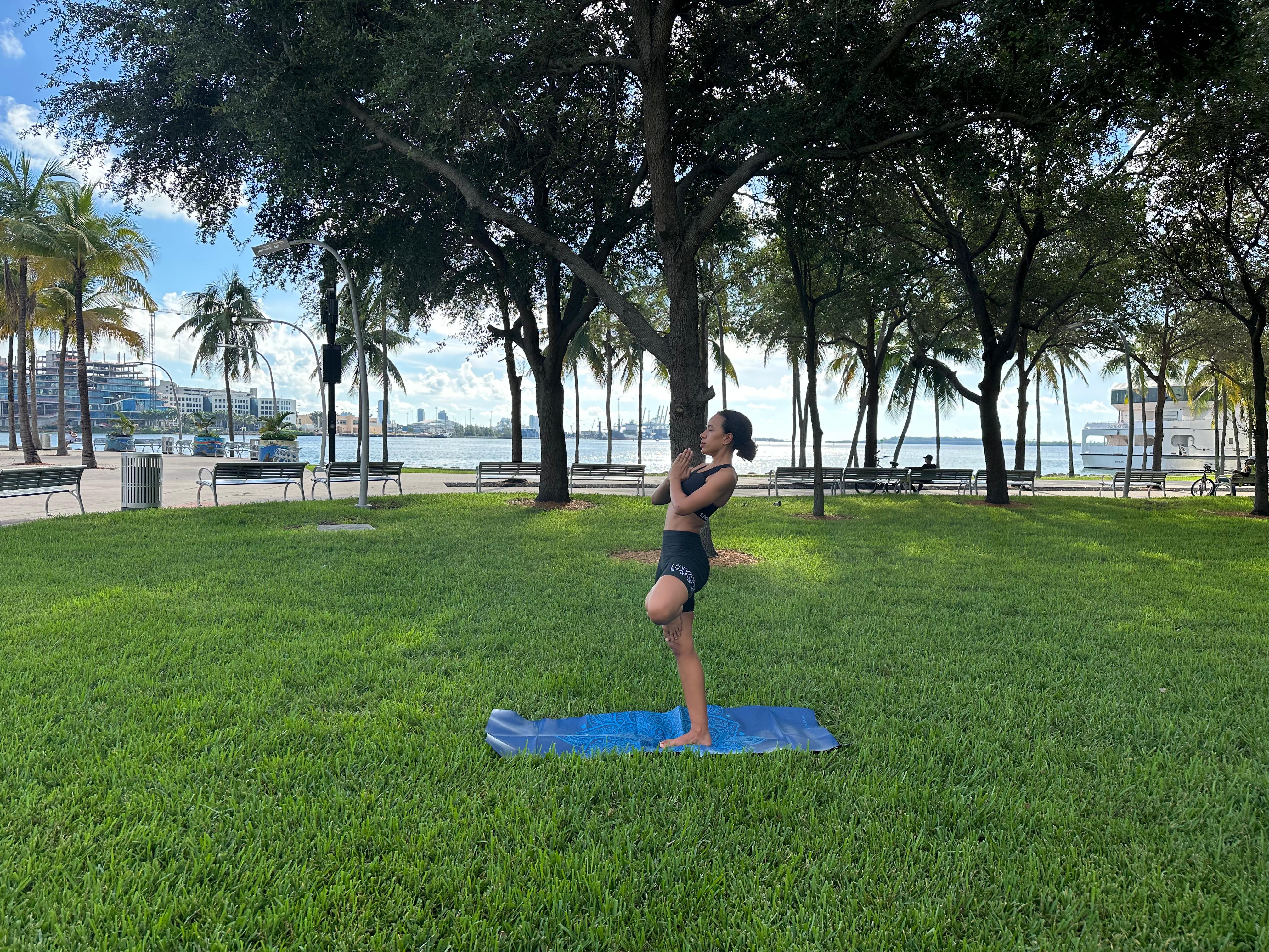 Tree pose by the water