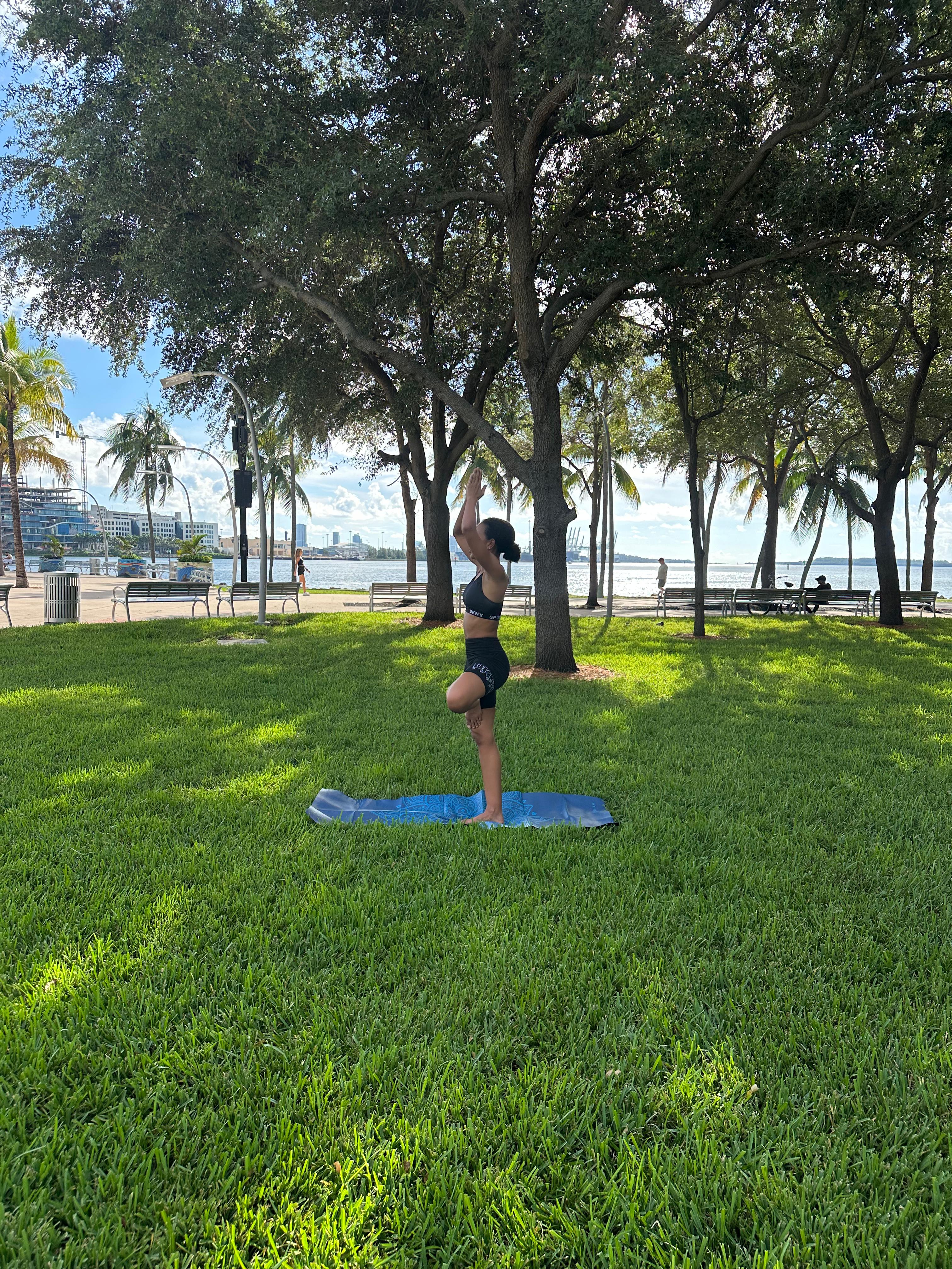 Tree pose with arms raised